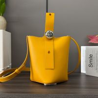 Loewe Mini Pebble Bucket Bag In Smooth Calfskin Yellow